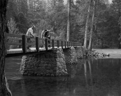 Fishing from the Merced River Foot Bridge Black and White.jpg