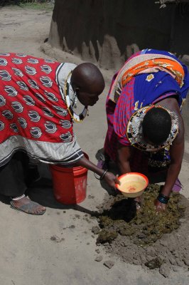 Preparing dung and mud..