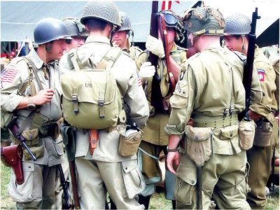 Members of the 82nd and 101st airborne gear up before a skirmish.