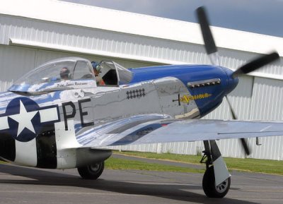 Pilot James Read cranks the engine.