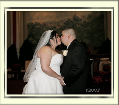 IMG_1287 wedding kiss natural lateral crop proof.jpg