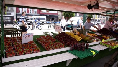 In the open-air market, cherries are 60 kroner ($10).