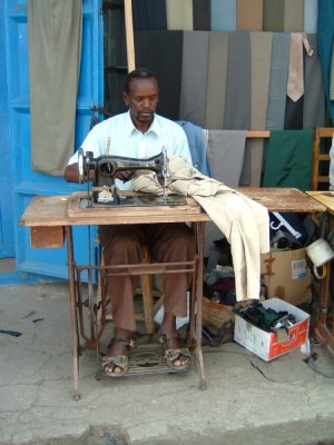 Nakuru, Kenya - repairing my pants for a staggering $0.30