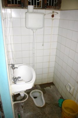 The bathroom (bucket = shower)