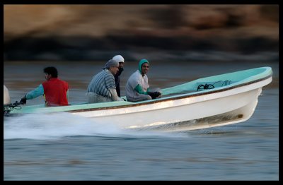 Fishermen with speedboat