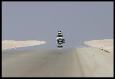 Road through Rub Al Khali (Empty quarter) with Fata Morgana