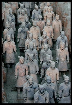 A collection of 8,099 life-size terra cotta figures of warriors and horses located near the Mausoleum of the First Qin Emperor