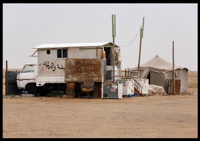 Small desert shop on the road to Al Abraq Oasis in the west