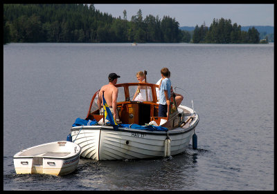 Bjorn Nilsson and relatives in his boat on lake Asa - Sweden 2004