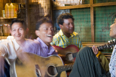 These guys were jamming in a little booth in a morning vegetable market  as it was closing up for the day