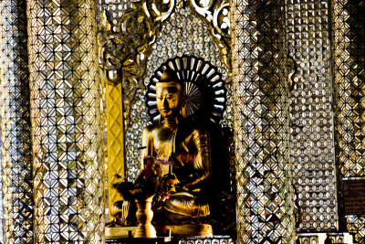 Buddha in a jewelled hall