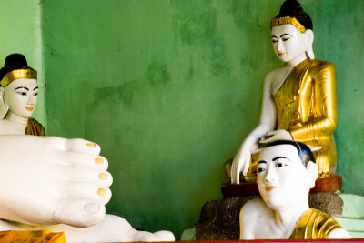Buddha's disciple, appearing to admire his foot