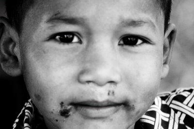 One of the kids living in the village by the garbage