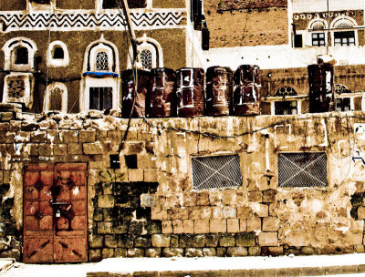 Sana'a House, piled with oil drums
