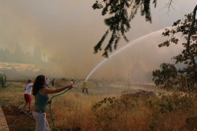 Firefighters bring the big hose