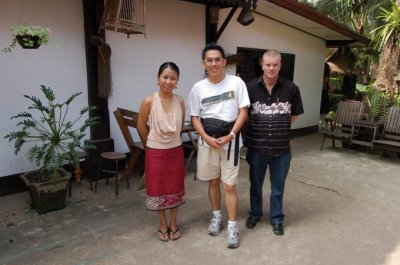 Photo with the owner of Thongbay Guesthouse, Ms Da & Wayne from N.Zealand.