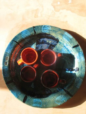 expresso mugs on a large blue platter