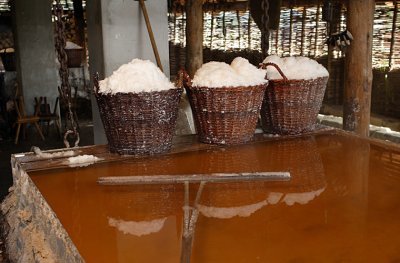 Salt produced by evaporation from brine.