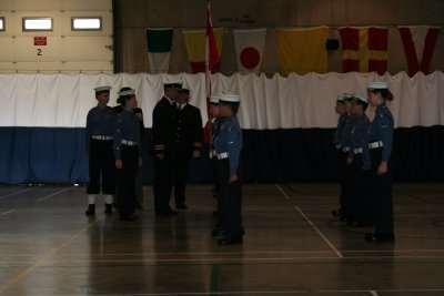 Being Inspected by HMCS Scotian Commanding Officer (Kaitlyn is rear rank at the end)