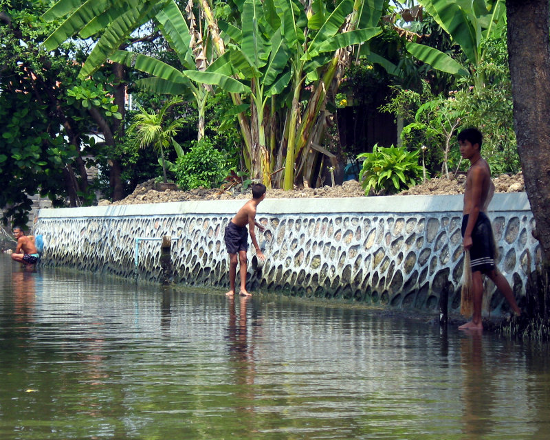 Boys Net Fishing in Klong in Pathum Thai