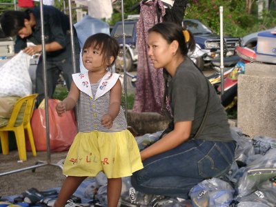 Little Girl Dancing to the Radio at a Pathum Thani Market