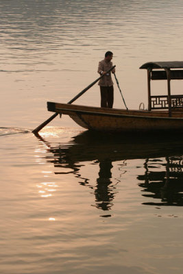 Boatman at sunset