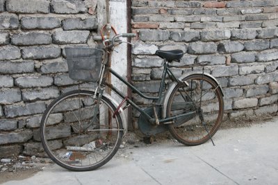 bike against a wall in Old Town