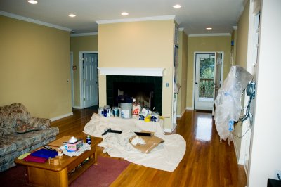 living room and fireplace being painted.jpg