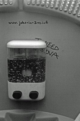 'www.jobs-in-iraq.info' In A Porto-Potty