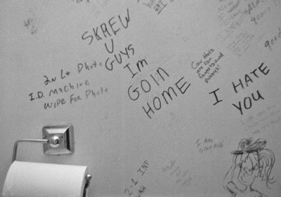 'Skrew U Guys' On A Bathroom Wall