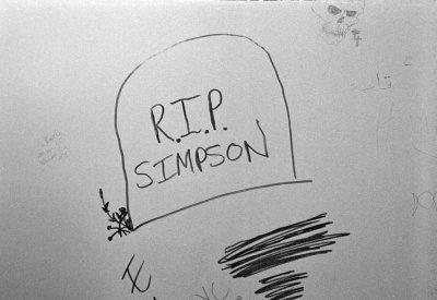 'R.I.P. Simpson' On A Bathroom Wall