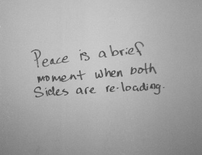 'Peace' On A Bathroom Wall