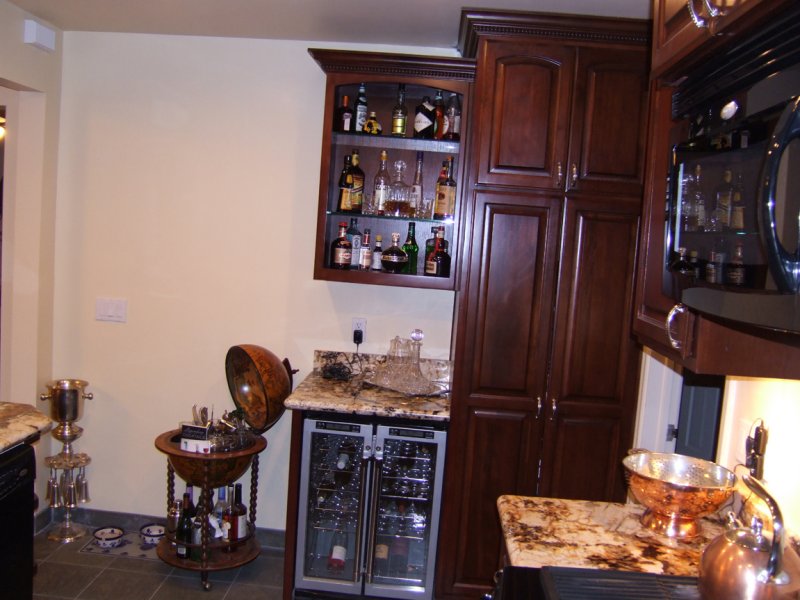 This view of the kitchen shows the built-in wine cooler