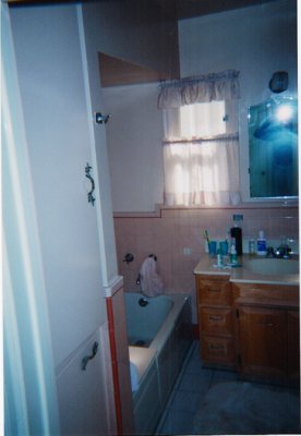 This was the master bathroom - pink was not our color!