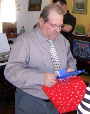 Jojo opens a gift.