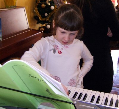 Louise at the keyboard.
