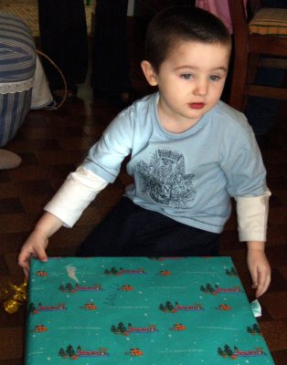 Daniel opens a gift.