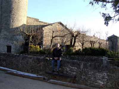 Anthony on the wall outside La Couvertoirade.