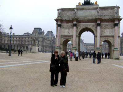 Sarah and Rill freeze outside The Louvre.