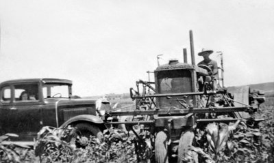 Gilbert Plowing Corn with Fern Watching From Car