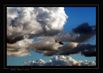 Helicopter in the clouds