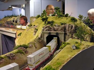 Clyde King (sitting), Rich Melconian (standing behind hill), and Bob Galli (partially out of photo to the right).  Train enters a short tunnel.