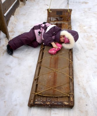 Young girl and sled