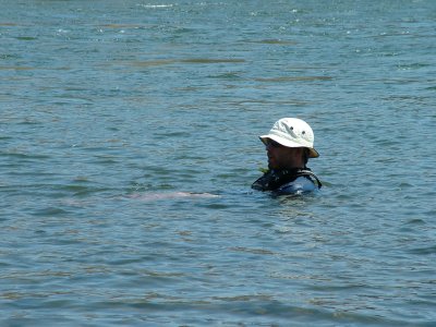 Day 7 Tyler staying cool waiting for the helicopters.JPG