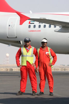 1527 4th October 06 Ramp Drivers Sharjah Airport.JPG