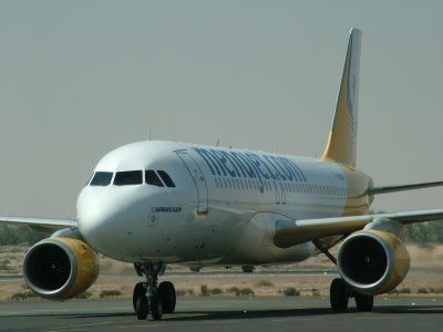 1350 17th May 06 Menajet operating for Air Arabia at Sharjah Airpor.JPG