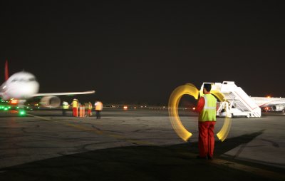2205 24th June 07 Marshalling Air Arabia at Sharjah Airport.JPG