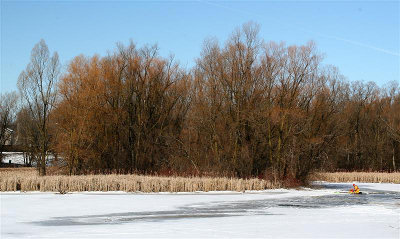 Wide Angle View Of Rescue Team On Icy River