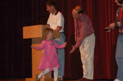 Reagan going up to get her soccer trophy