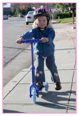 Emily traded in her bottles for this sweet scooter...